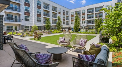 a lawn with lounge seating