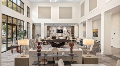 a spacious lounge with natural lighting