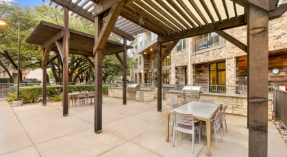 Grilling station and lush landscaping