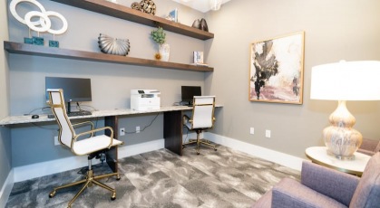 resident office area with comfortable chairs and counterspace