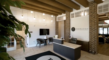 lobby and lounge area with wooden ceilings