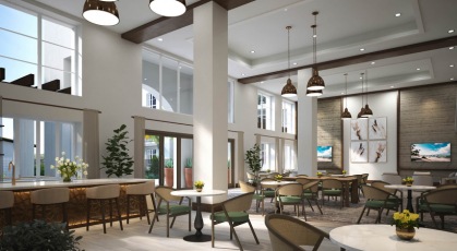spacious lobby with high ceilings and ample lighting throughout
