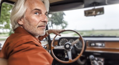 man in a car