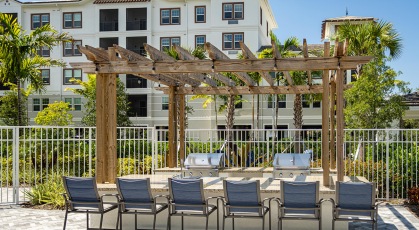 pergola over grills with counter seating