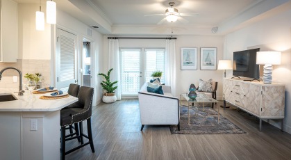 living room with private balcony access
