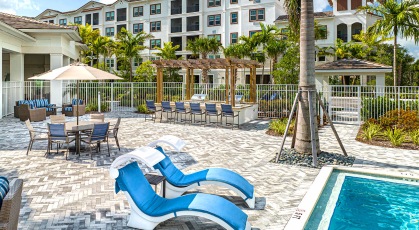 lounge chairs near swimming pool
