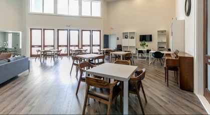 spacious rec room with high ceilings