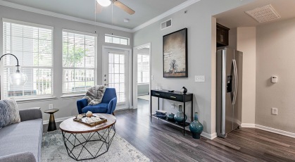 wide bright windows brighten living room