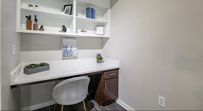 study desk with built-in shelving